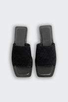 Lenny Sandals displayed in both suede and leather options, showcasing their luxurious materials and classic design.