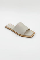 Lenny Sandals displayed in both suede and leather options, showcasing their luxurious materials and classic design.