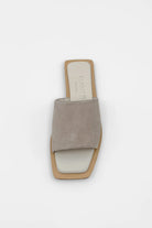 Lenny Sandals displayed in both suede and leather options, showcasing their luxurious materials and classic design.