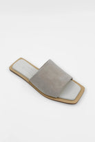 Lenny Sandals displayed in both suede and leather options, showcasing their luxurious materials and classic design.