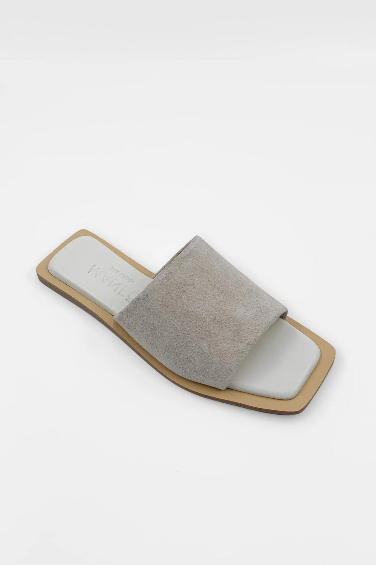 Lenny Sandals displayed in both suede and leather options, showcasing their luxurious materials and classic design.