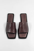 Lenny Sandals displayed in both suede and leather options, showcasing their luxurious materials and classic design.