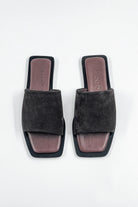 Lenny Sandals displayed in both suede and leather options, showcasing their luxurious materials and classic design.
