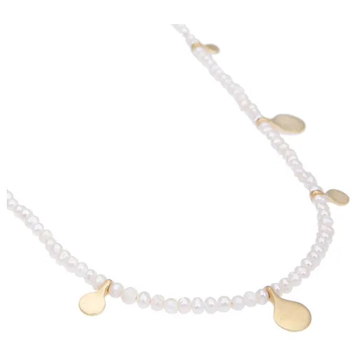 Pearl Necklace: Timeless elegance captured in lustrous pearls, a symbol of sophistication and grace.