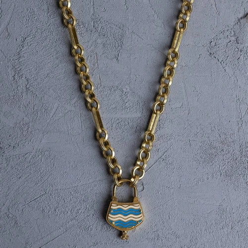 Bari Necklace: A coastal-inspired beauty, this necklace combines boho elegance with beachy vibes. The intricately crafted charms capture the essence of sun-soaked days, adding a touch of laid-back allure to your look.