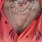 Bari Necklace: A coastal-inspired beauty, this necklace combines boho elegance with beachy vibes. The intricately crafted charms capture the essence of sun-soaked days, adding a touch of laid-back allure to your look.