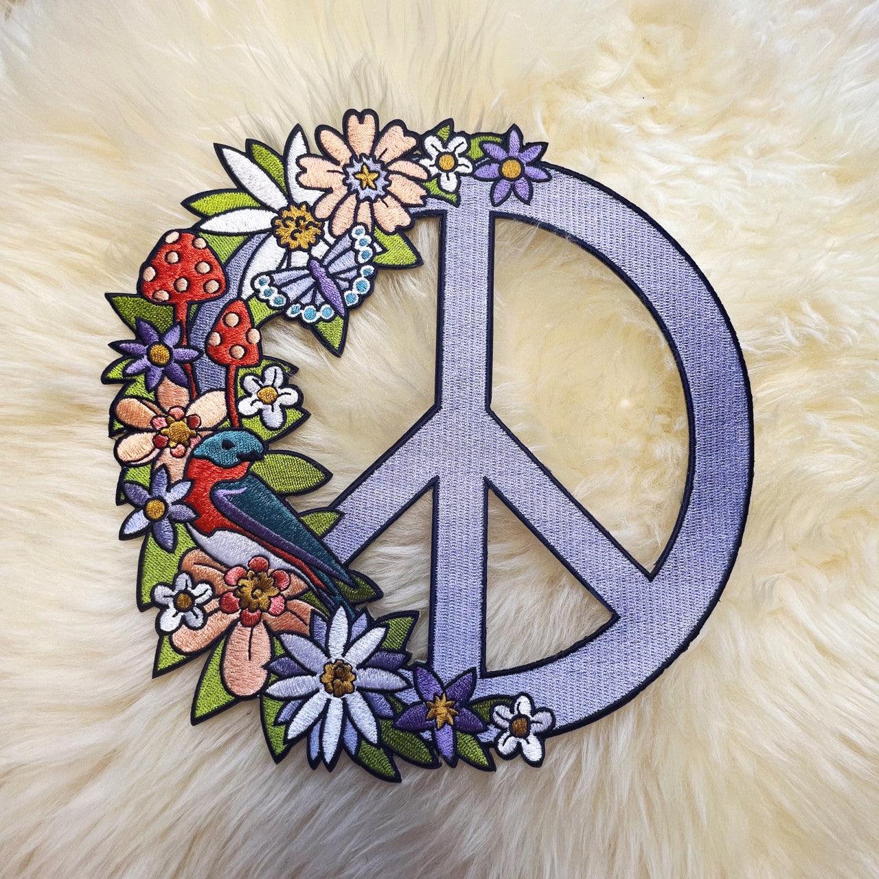 Floral Peace Sign Patch, showcasing a detailed peace symbol adorned with vibrant blossoms, symbolizing unity and nature's splendor.
