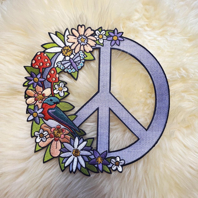 Floral Peace Sign Patch, showcasing a detailed peace symbol adorned with vibrant blossoms, symbolizing unity and nature's splendor.