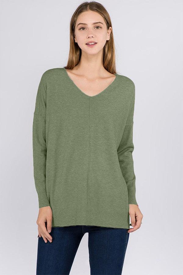 Sasha Sweater showcasing its cozy fabric blend and trendy design, perfect for a stylish and comfortable outfit.