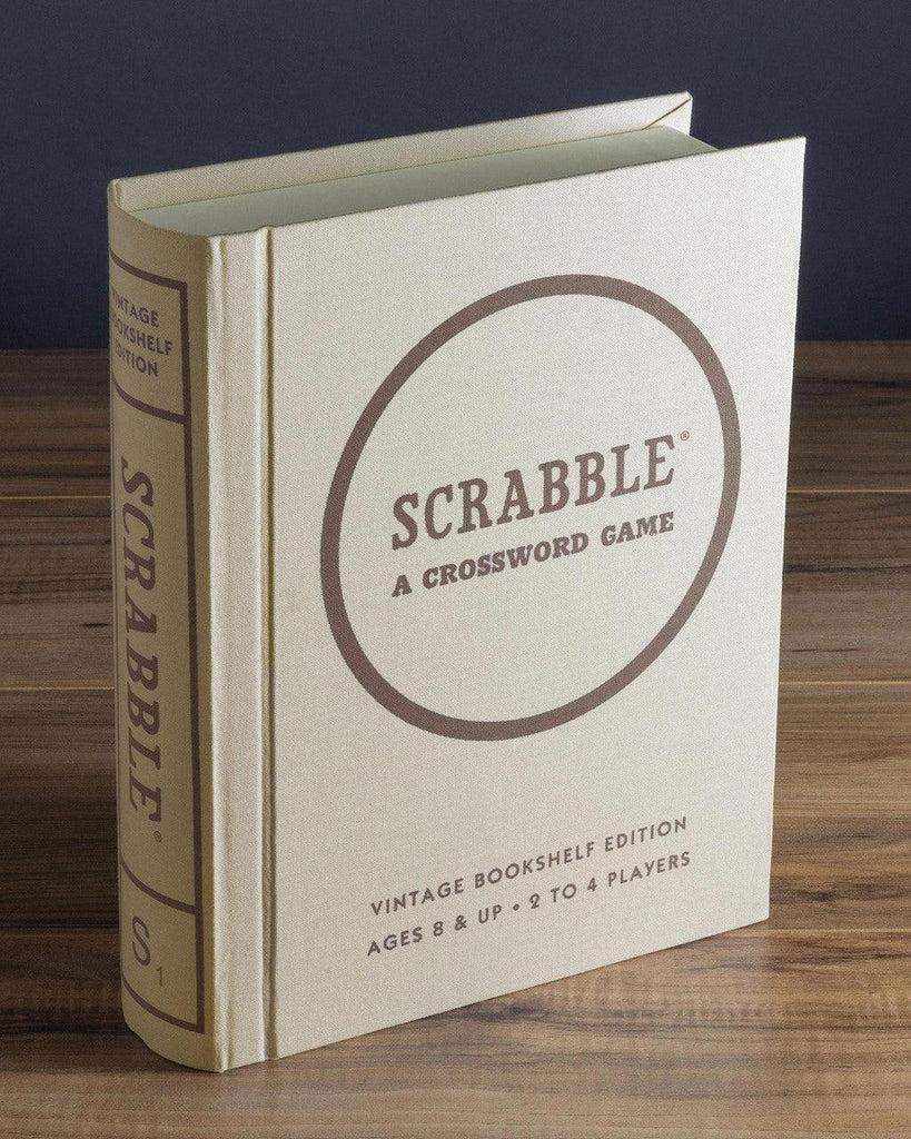 Vintage bookshelf edition of Scrabble game with wooden tiles.