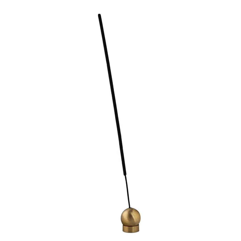 A modern Sphere Incense Holder placed on a minimalist backdrop, ideal for holding incense sticks in a stylish and secure manner.