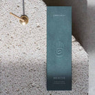 Natural incense sticks in a stylish green box with a built-in holder, designed for relaxation and mindfulness.