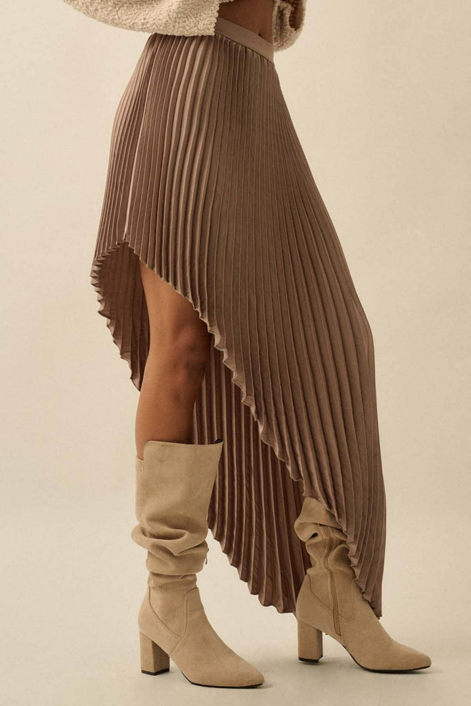 Brown asymmetric pleated skirt with flowing high-low hem.