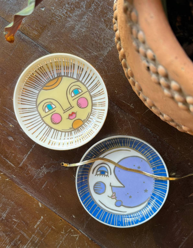 Moon trinket dish with a whimsical moon design in blue and purple accents, perfect for holding small items.