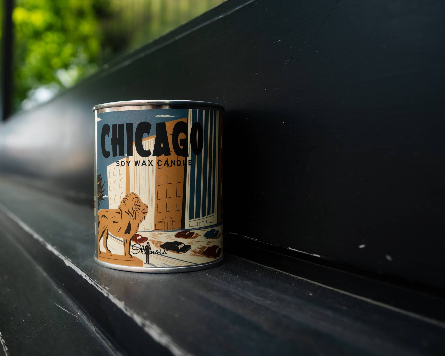 Chicago Candle: A lit candle emanating warmth and comfort, epitome of relaxation.