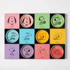 Round Snoopy pin dish with Snoopy lying on top of his doghouse.