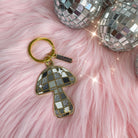 Disco Mushroom Enamel Keychain featuring a colorful, funky mushroom with a disco ball cap.