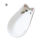 A set of Japanese Style Cat Ceramic Dishes with various adorable cat designs, perfect for serving soy sauce or small snacks.