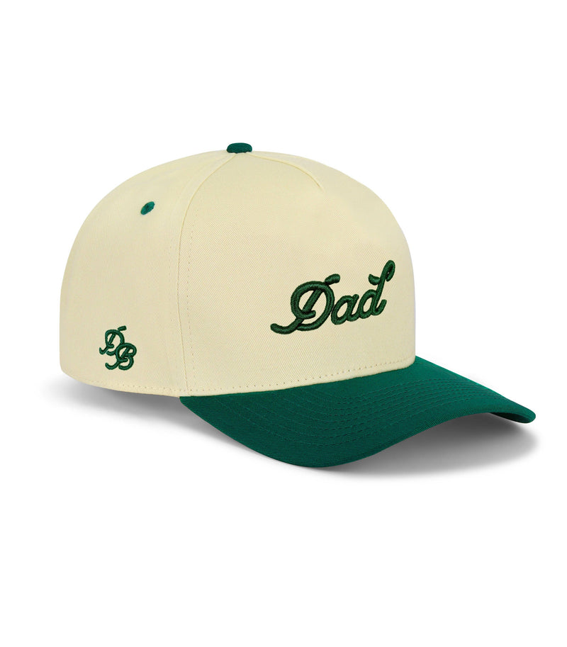 Beige and green cap with 'Dad' and logo on a white background