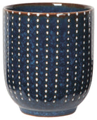 Pulse Cups, porcelain with vibrant blue and white stamped design.