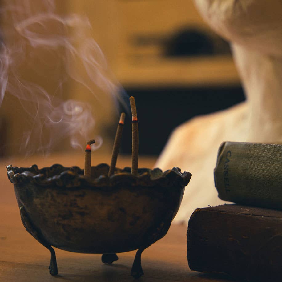 Gaia natural incense sticks in a terracotta box with an embossed tree design and built-in holder for relaxation and grounding.