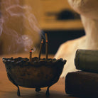 Natural incense sticks in a stylish green box with a built-in holder, designed for relaxation and mindfulness.