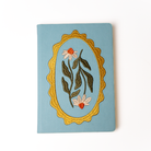 Daisy Frame hardbound notebook by Denik, daisy embroidery on a soft-touch vegan leather cover