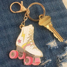 Roller Skate Keychain with a fun roller skate design and star accent.