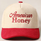 Corduroy trucker baseball cap with "American Honey" embroidered in red on cream and red fabric.