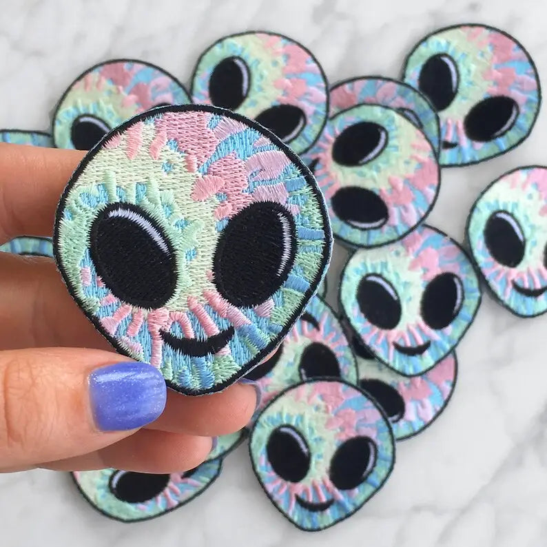 A colorful Alien Patch, 100% embroidered, showcasing intricate details and vibrant design.