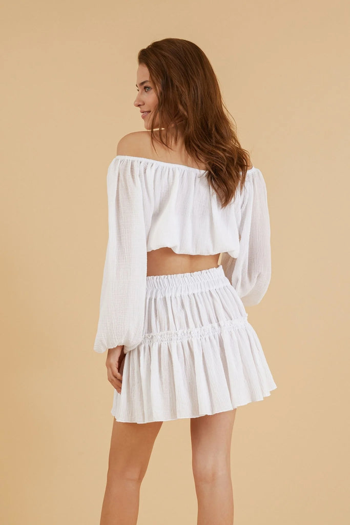 Ash Mini Ruffle Skirt - Flirty and feminine A-line skirt with ruffled layers.