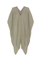 A woman gracefully wearing the Ava Kimono, showcasing its flowing silhouette, delicate patterns, and high-quality fabric.