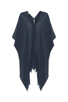 A woman gracefully wearing the Ava Kimono, showcasing its flowing silhouette, delicate patterns, and high-quality fabric.