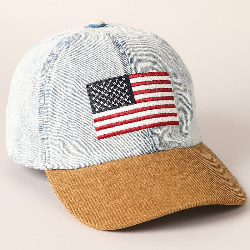 Denim cap with American flag patch on a beige background