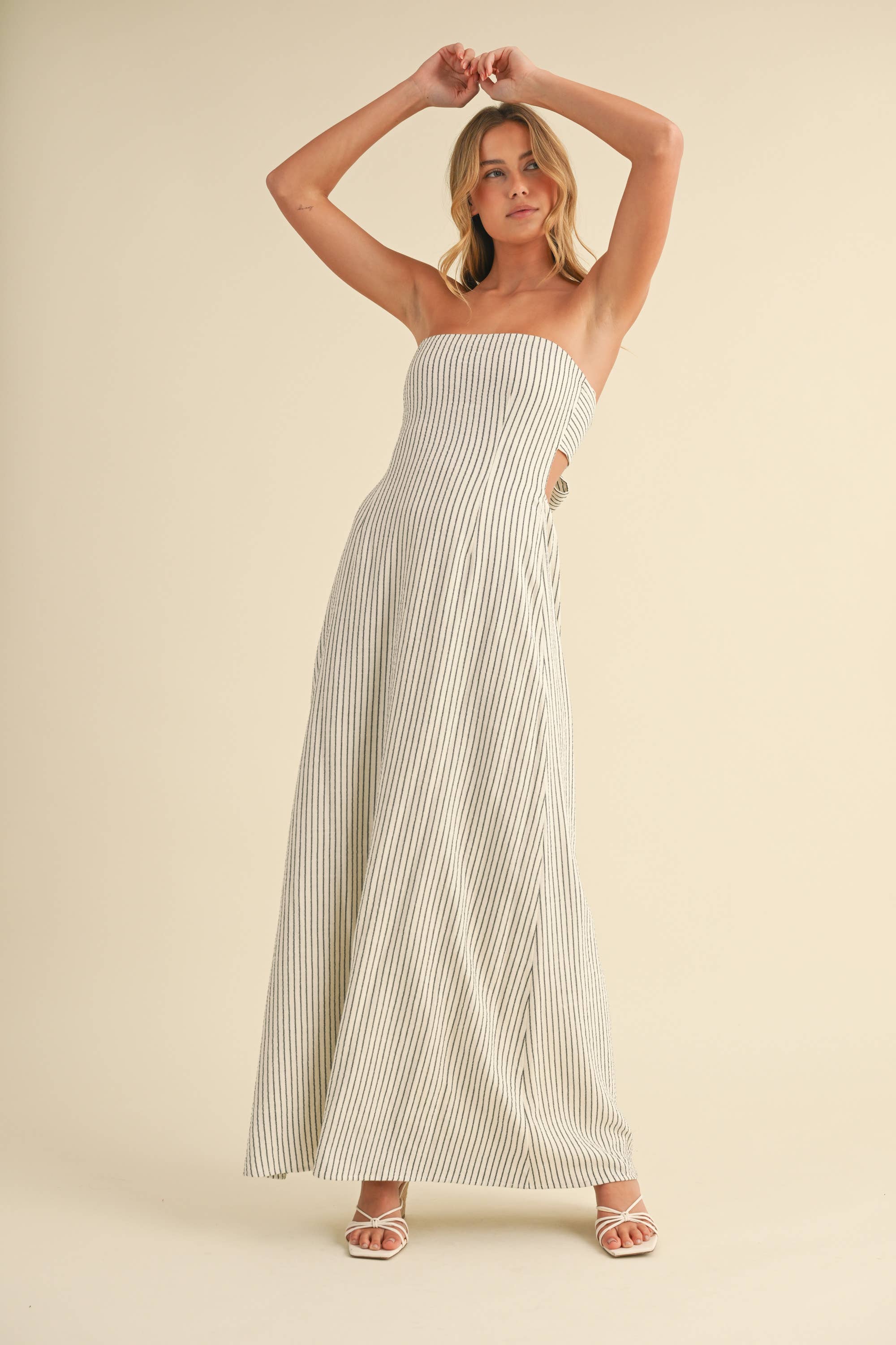 Back-tie strapless striped maxi dress with full-length skirt and bow detail
