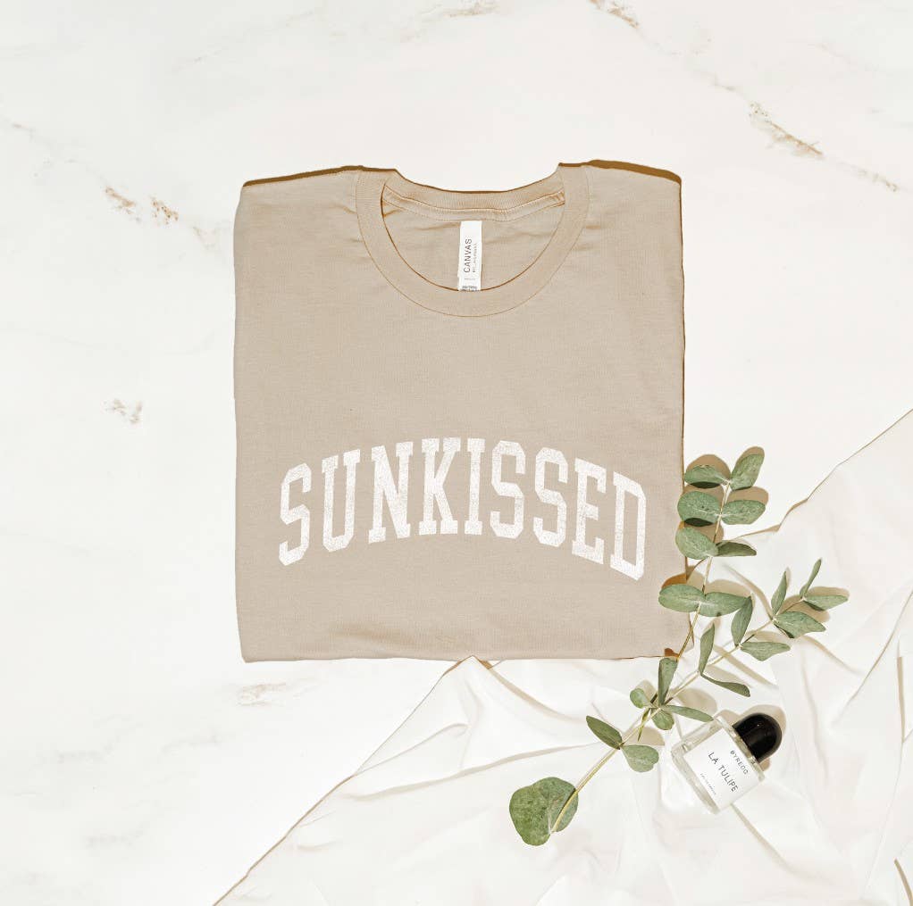 Sunkissed T-Shirt: White shirt with a large sun design.