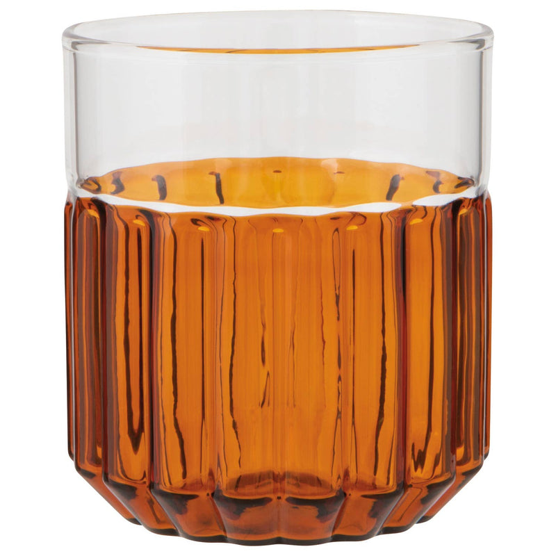 Amber-colored glass with textured design on a white background