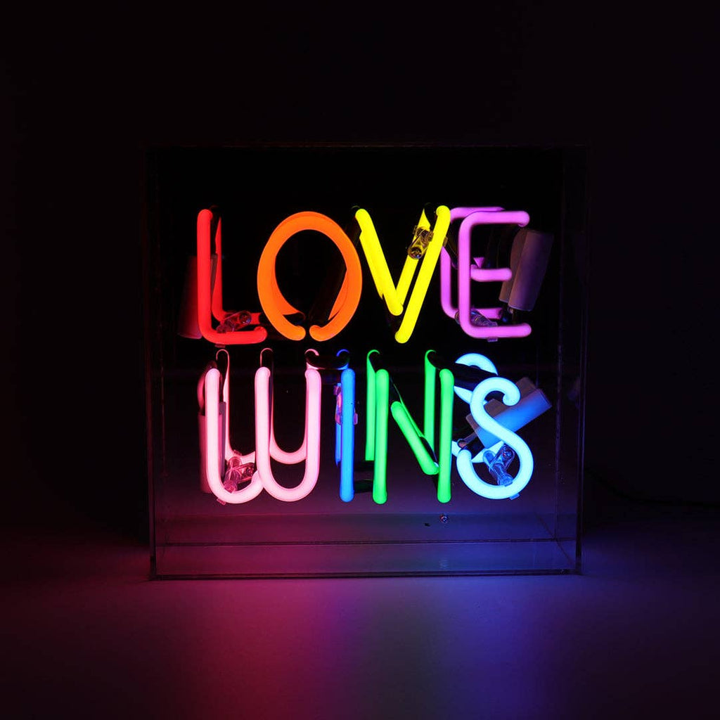 'Love Wins' Neon Light - A bright and inclusive symbol of love and unity.