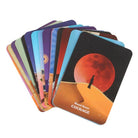 Moonology Messages Oracle deck in pastel aqua packaging with a glowing moon, rainbow prism, and white blossoms.
