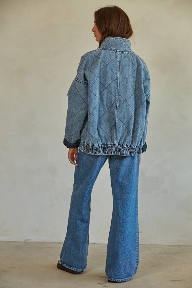 A denim jacket with a serene, minimalist design.