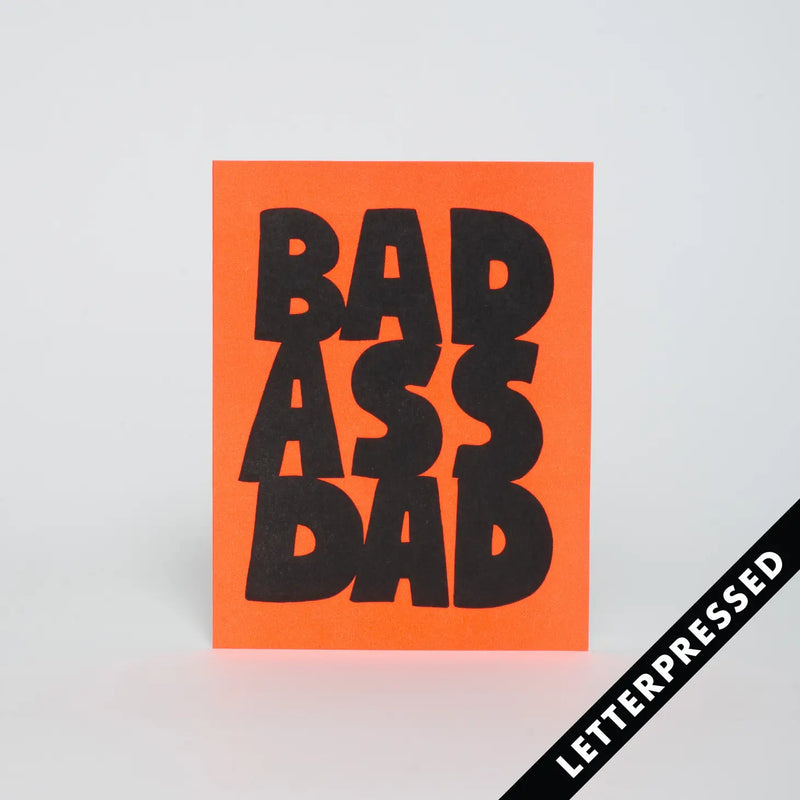 Image of the 'Bad Ass Dad Card', showcasing its vibrant design and the humorous appreciation message for dads.