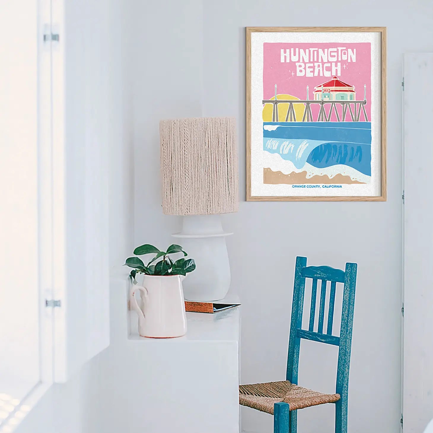 Artistic print depicting Huntington Beach's signature waves and pier, a nod to the surf city's enduring allure.