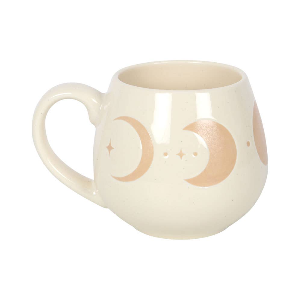 Ivory mug with moon phase design and cork coaster.