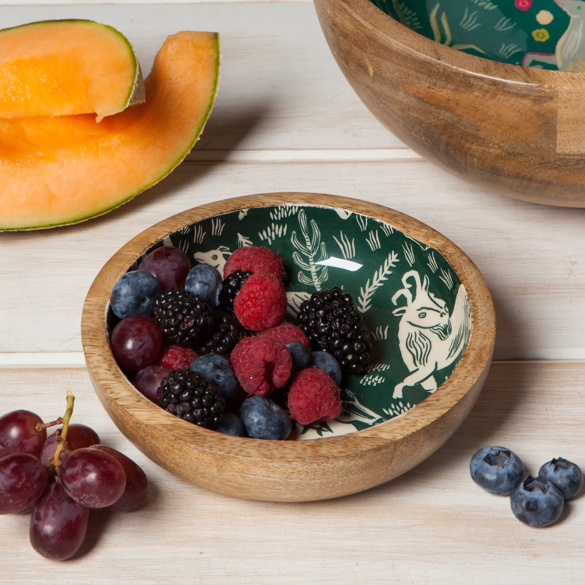 Floral Shallow Mango Wood Bowl, featuring a handcrafted floral design and rich wood grain, on a neutral backdrop.