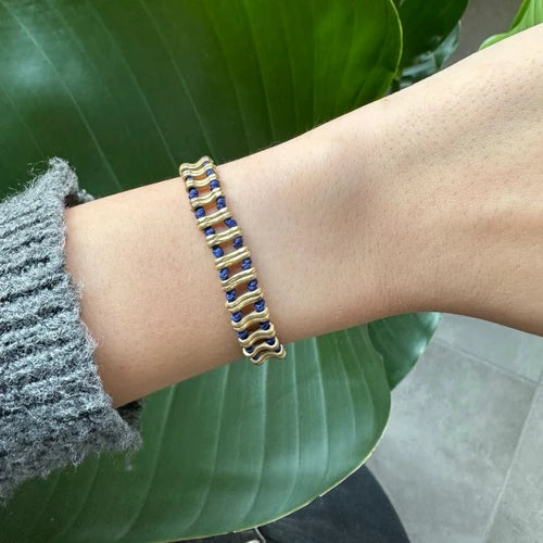 Bone Bracelet - Intricately carved bone beads for a statement of natural elegance.