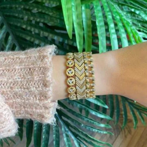 Arc Bracelet: A modern masterpiece of sleek design and timeless elegance, this bracelet is the epitome of contemporary chic, adding a touch of sophistication to your ensemble.