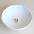 Polished Brass Round Incense Holder with a minimalist design, placed on a serene backdrop, perfect for holding your favorite incense.