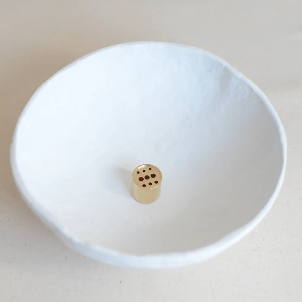 Polished Brass Round Incense Holder with a minimalist design, placed on a serene backdrop, perfect for holding your favorite incense.