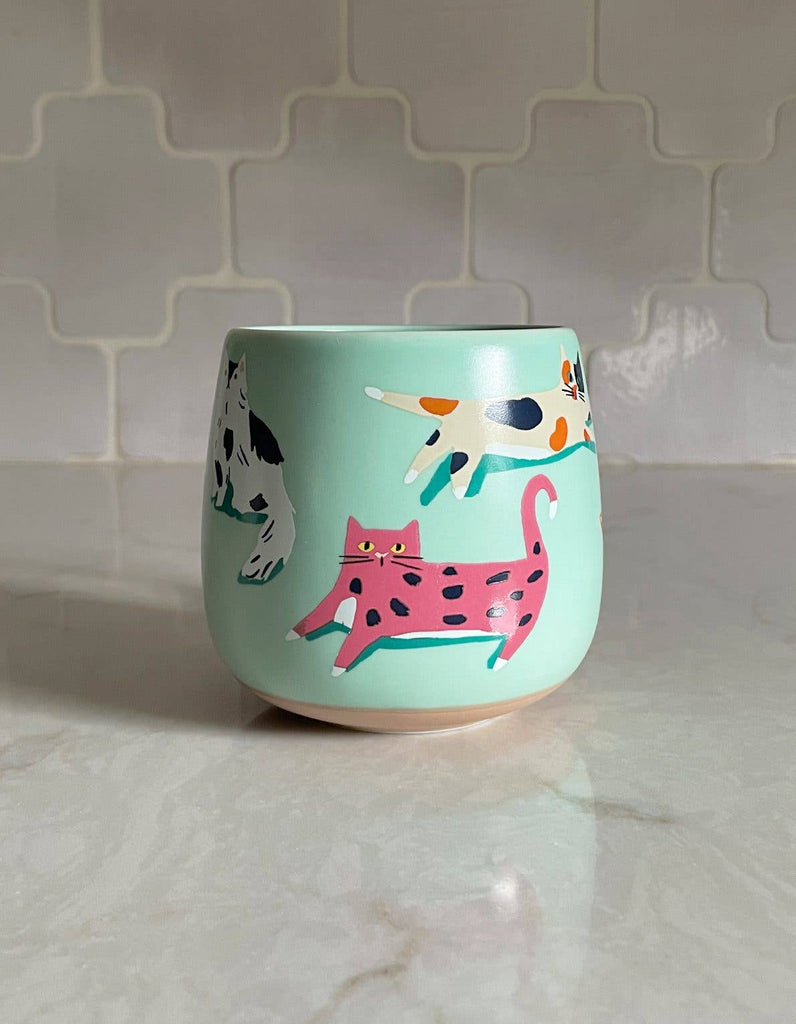FORMA Ceramic Cats Mug - Whimsical cat illustrations for charming coffee moments.