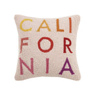 Square ivory hook pillow with multicolor block letters spelling "California" in a vertical layout.